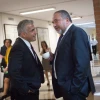 Yisrael Beiteinu leader Avigdor Lieberman (right) speaks with Yesh Atid Party leader Yair Lapid in the corridors of the Knesset on Nov. 16, 2015. Photo by Miriam Alsterl/Flash90.