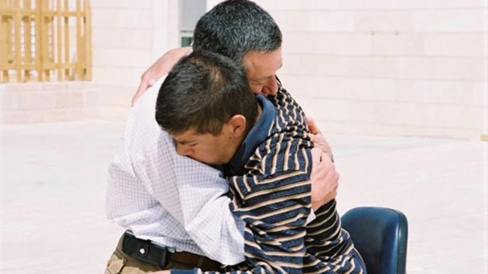 Maj. Gen. (Res.) Doron Almog and his son, Eran, at ALEH Negev-Nahalat Eran in 2012. Credit: Courtesy.