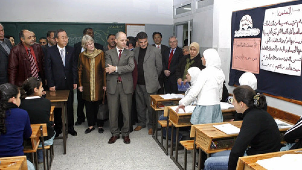 U.N. Secretary-General Ban Ki-moon (second, front left) visits a Palestinian school in Bethlehem in March 2007. Credit: UN/Evan Schneider.