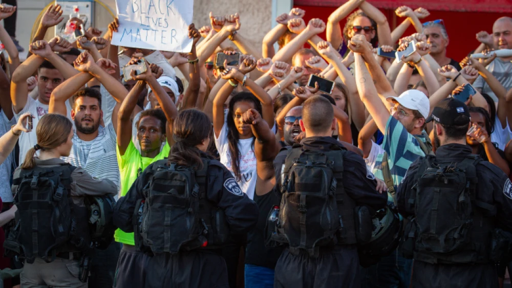 Ethiopian Israelis and supporters take part in a protest against police violence and discrimination following the death of 19-year-old Solomon Tekah, in Kiryat Ata on July 3, 2019. Photo by Flash90.