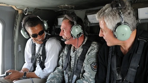 Click photo to download. Caption: In July 2008, U.S. Army Gen. David H. Petraeus (center), then commander of Multi-National Force-Iraq, gives an aerial tour of Baghdad to then Senators Barack Obama (far left) and Chuck Hagel (far right). Credit: U.S. Air Force/Staff Sgt. Lorie Jewell.