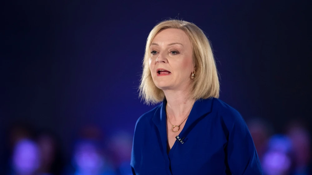 Then-Foreign Secretary Liz Truss at the Conservative Party leadership hustings event in Cardiff, Wales, on Aug. 3, 2022. Credit: ComposedPix/Shutterstock.