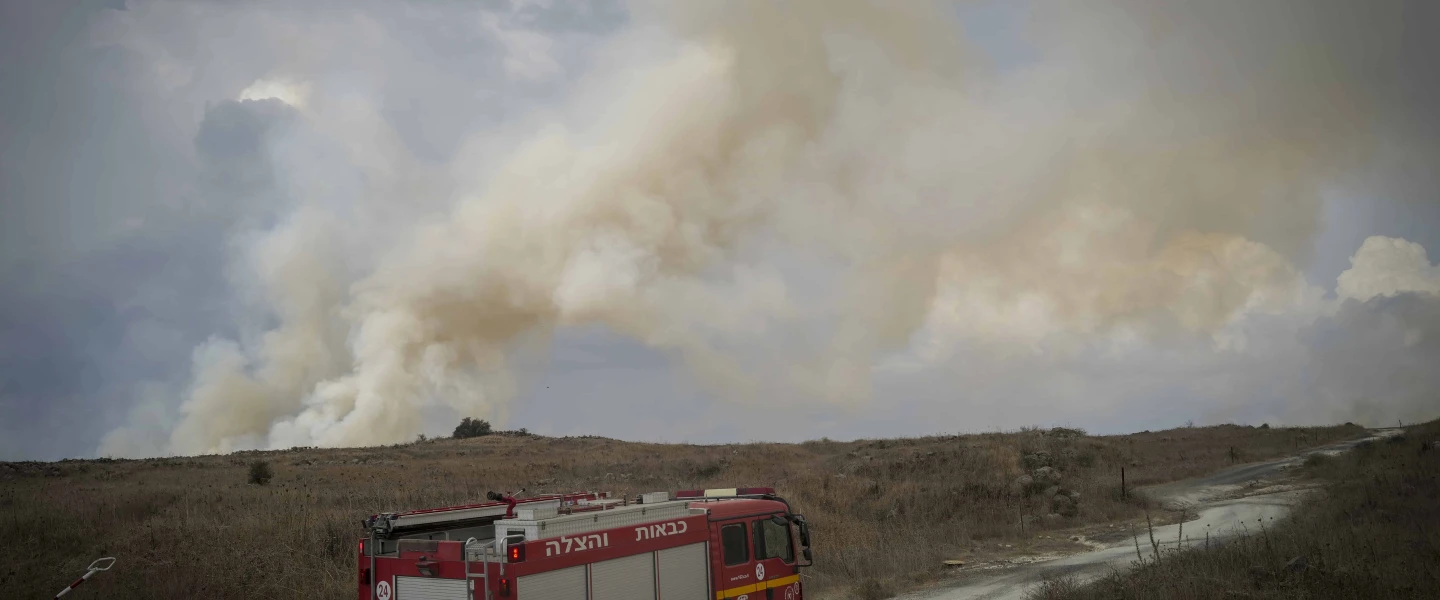 Firefighters combat wildfires following a 25-missile barrage on the northern town of Katzrin and central Golan Heights, Nov. 3, 2024. Photo by Michael Giladi/ Flash90.
