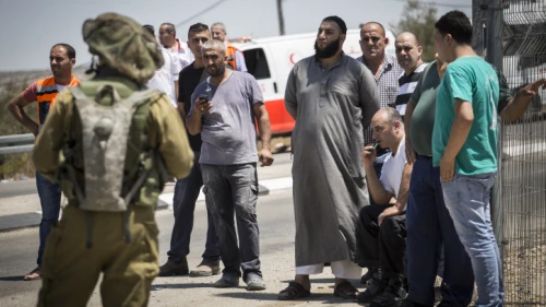 The family of the Palestinian man who stabbed a soldier, at the Bell checkpoint on Road 443, Aug. 15, 2015. Photo by Hadas Parush/Flash90.