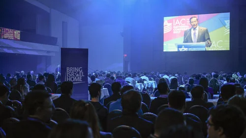 Attendees of the Israeli-American Council's (IAC) national conference listen to remarks by Adam Milstein, IAC's chairman, earlier this month in Washington, D.C. Credit: Alycia Kravitz.