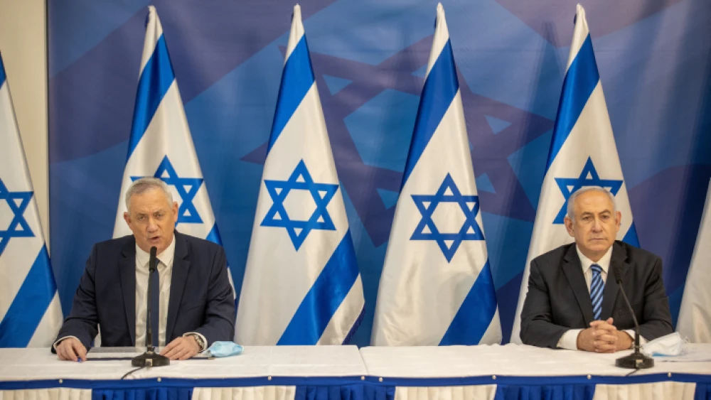 Israeli Prime Minister Benjamin Netanyahu and Defense Minister Benny Gantz hold a press conference in Tel Aviv on July 27, 2020. Photo by Tal Shahar/POOL.