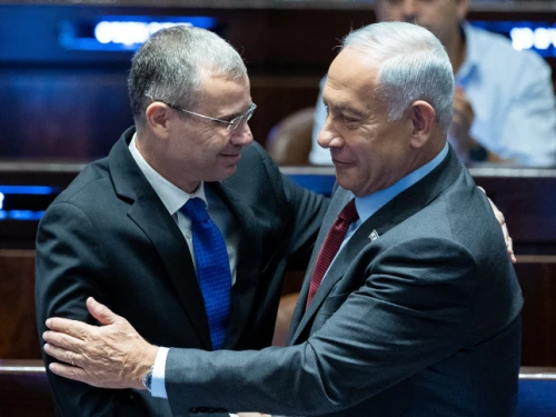 Knesset Speaker Yariv Levin, soon to be justice minister, and incoming Prime Minister Benjamin Netanyahu speak at the legislature in Jerusalem, Dec. 13, 2022. Photo by Yonatan Sindel/Flash90.