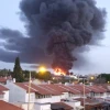 A burning factory in the southern Israeli city of Sderot that was hit by a rocket fired from Hamas-controlled Gaza on June 28, 2014. Credit: Natan Flayer via Wikimedia Commons.