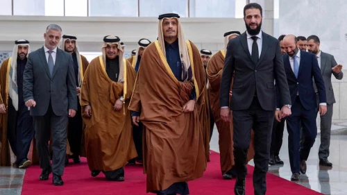 Qatari Prime Minister Sheikh Mohammed bin Abdulrahman Al Thani and Syrian leader Ahmed al-Sharaa