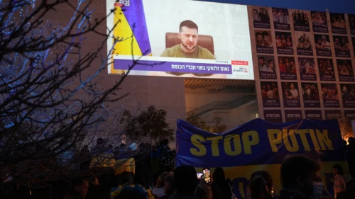Demonstrators against the Russian invasion of Ukraine attend a televised video address by Ukraine's President Volodymyr Zelenskyy, in Tel Aviv on March 20, 2022. Photo by Chen Leopold/Flash90.
