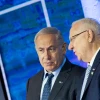 Israeli Prime Minister Benjamin Netanyahu with President Reuven Rivlin during the Israel prize ceremony at the International Conference Center (ICC) in Jerusalem on May 2, 2017. Credit: Yonatan Sindel/Flash90.