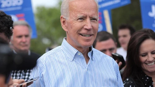 Former U.S. Vice President Joe Biden walks with supporters at a march in Clear Lake, Iowa, on Aug. 9, 2019. Photo: Gage Skidmore via Wikimedia Commons.