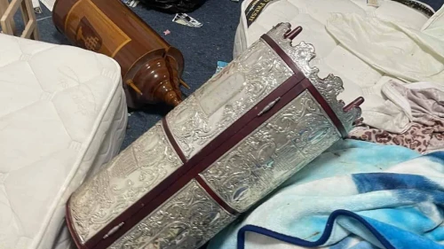 Torah scrolls lie on the floor of the Mishkan Shalom Yemenite Synagogue in Kadima-Zoran after vandals ripped holy books and scattered pages throughout the sanctuary. Image used under Section 27a of the Copyright Law for purposes of reporting the news.