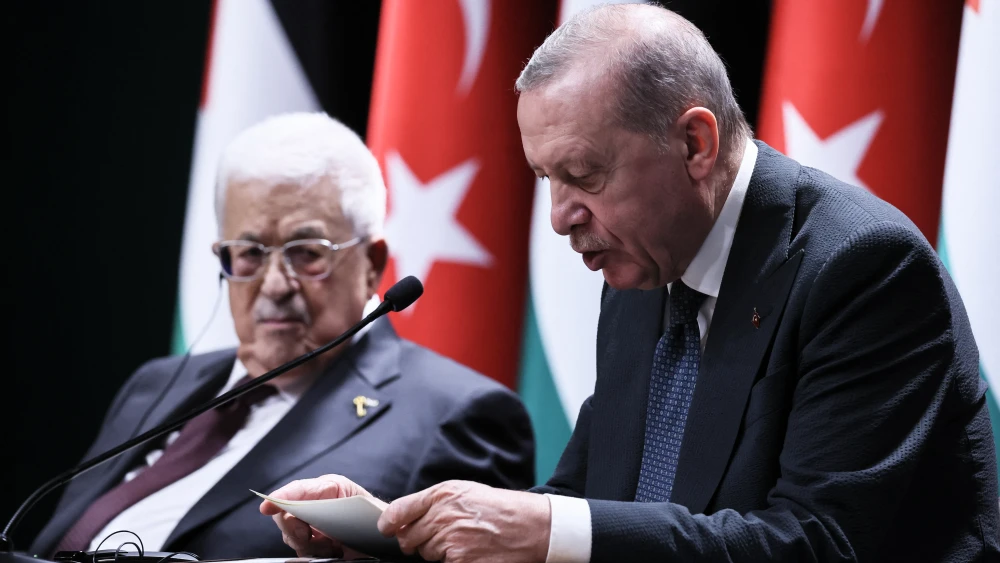 Turkish President Recep Tayyip Erdogan, right, speaks alongside Palestinian Authority President Mahmoud Abbas during a news conference at the presidential palace in Ankara, Turkey, on Aug. 12, 2026. Photo by Adem Altan/AFP via Getty Images.