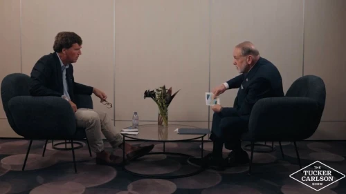 Political commentator and podcaster Tucker Carlson interviews U.S. Ambassador to Israel Mike Huckabee at Ben-Gurion International Airport, Feb. 18, 2026. Source: Tucker Carlson/YouTube.