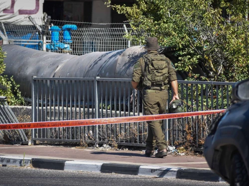 An Israeli soldier at the scene where part of a ballistic missile fired from Iran fell outside a major city in Samaria, June 19, 2025. Photo by Hoshenya Yarden/Flash90.