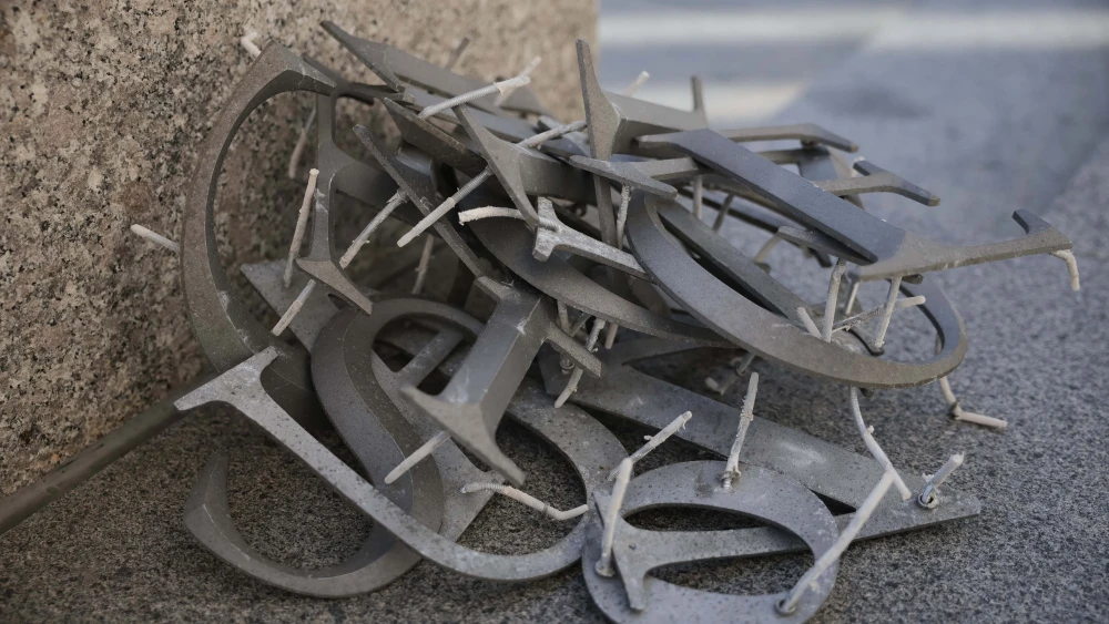 A pile of building letters after a worker removed the U.S. Agency for International Development (USAID) sign on its headquarters in Washington, DC., Feb. 7, 2025. Photo by Kayla Bartkowski/Getty Images.