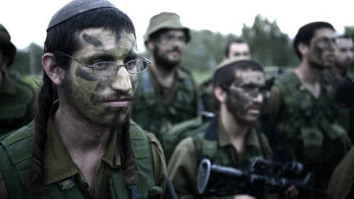 Infantrymen in the IDF's Orthodox Netzah Yehuda (“Nahal Haredi”) Battalion complete the final stages of a 40-kilometer march, Feb. 16, 2010. Photo by Abir Sultan/Flash90.