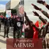 Popular Front for the Liberation of Palestine student group at Birzeit University hold a military-style rally with mock explosive belts and rockets. Source: Screenshot/MEMRI.
