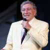 Tony Bennett performing at the New Orleans Jazz and Heritage Festival. Credit: Adam McCullough/Shutterstock.