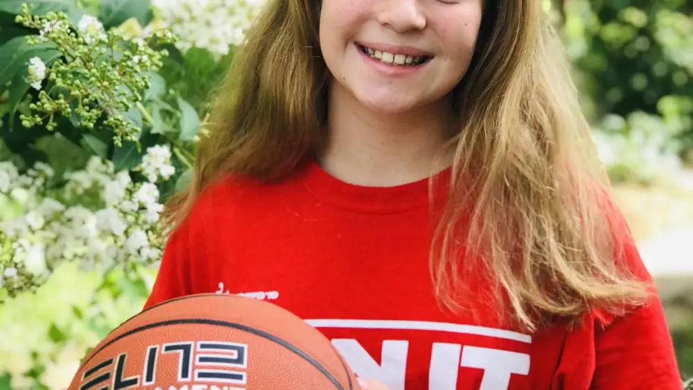This past March and in honor of her bat mitzvah, Adi organized a basketball ‘“shoot-a-thon” to raise money to bring the “Hoops for Kids” program to Emunah Israel. Credit: Courtesy.