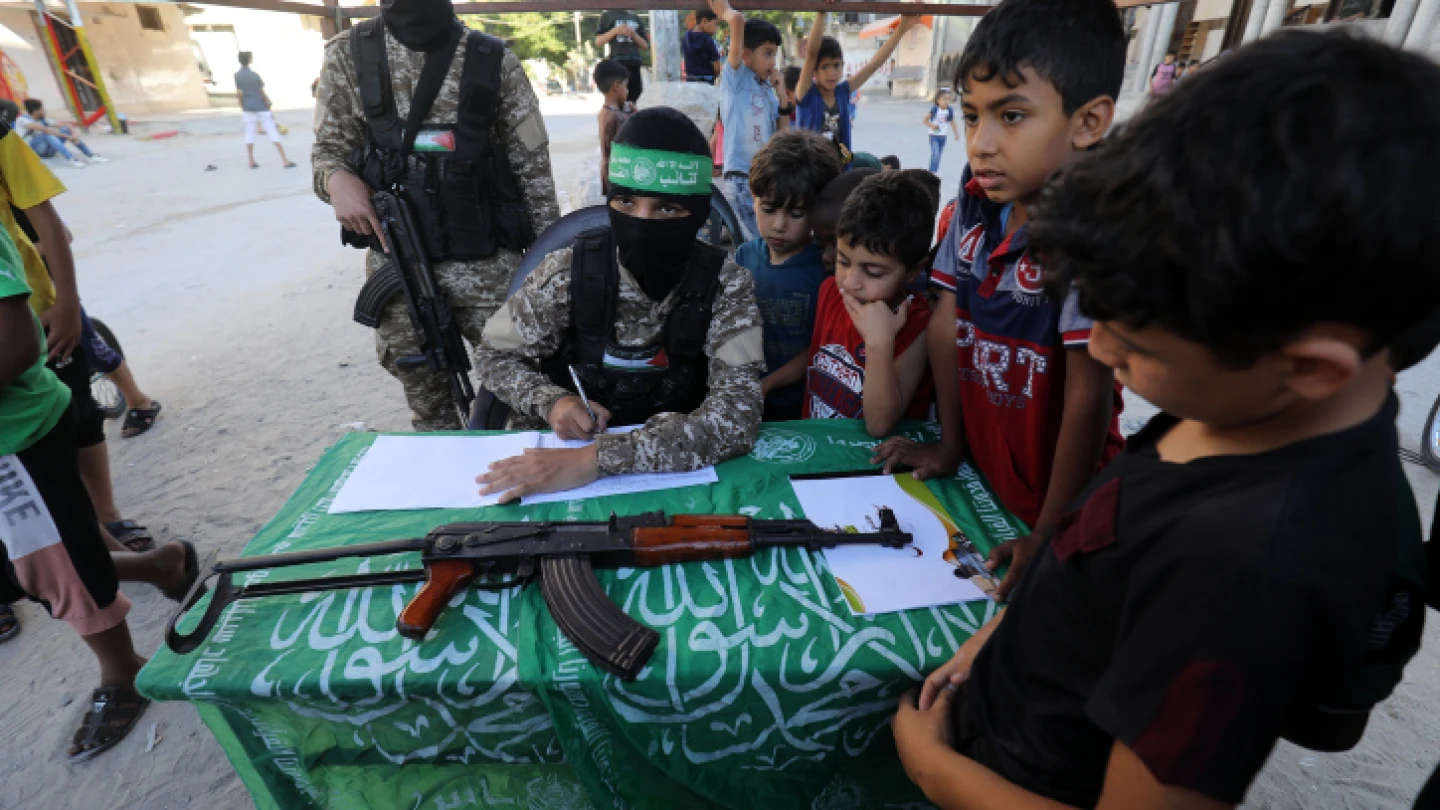 Hamas terrorists register Palestinian children for “Saif Al-Quds” camps in Rafah, in the southern Gaza Strip, on June 14, 2021. Photo by Abed Rahim Khatib/Flash90.