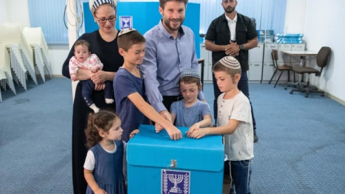 Yamina Party candidate Bezalel Smotrich and his family cast their ballots at a voting station in Kdumim on Sept. 17, 2019. Photo by Sraya Diamant/Flash90.