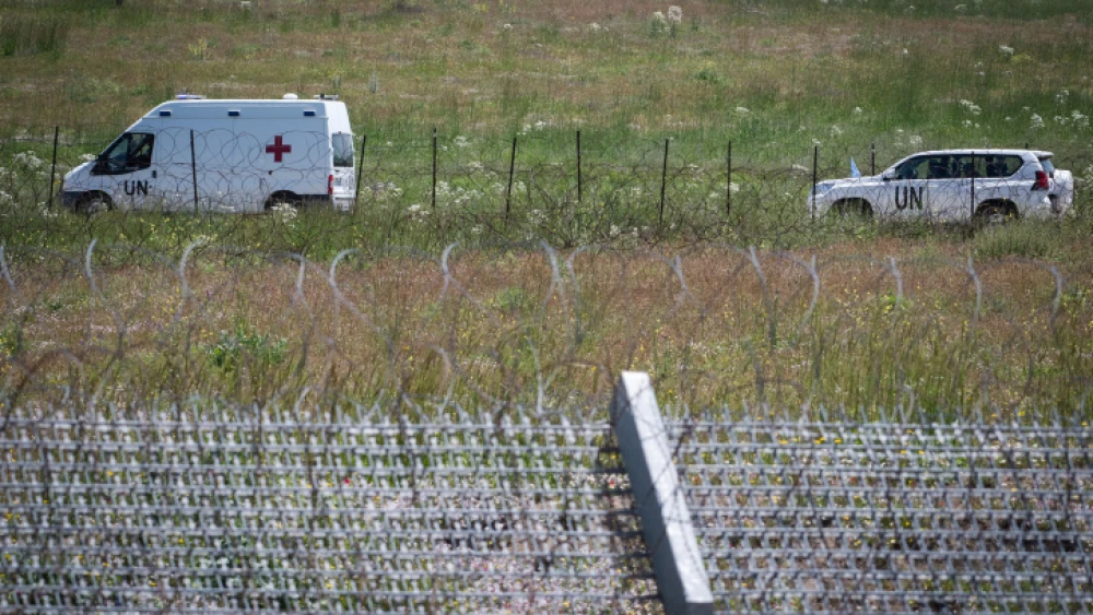 U.N. peacekeepers transfer two Syrian prisoners from Israel to Syria following the return of the body of Israeli soldier Zachary Baumel, at the Quneitra Border crossing, in the Golan Heights, on April 28, 2019. Photo by Basel Awidat/Flash90.