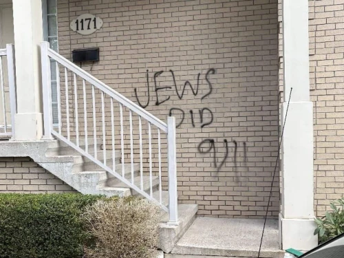 Antisemitic graffiti defaces a building associated with Chabad-Lubavitch of the Maritimes Rohr Family Institute in Halifax, Canada, on Sept. 14, 2025. Source: @IsraelaMTL/X.