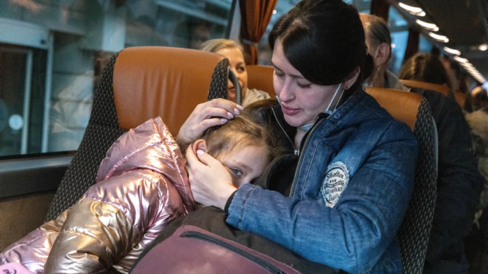 Jewish Ukrainians who fled war zones in Ukraine, seen leaving for the airport to board a Jewish Agency plane to Israel, March 6, 2022, in Warsaw, Poland. Photo by Olivier Fitoussi/Flash90.