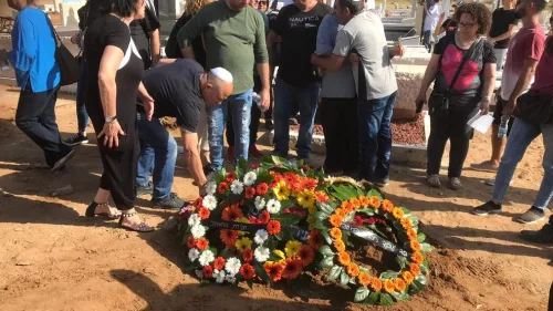 Mourners lay wreaths at the grave of Moshe Agadi, who was killed as a result of rockets launched into Israel from the Gaza Strip, on May 5, 2019. Photo by Avi Cohen.