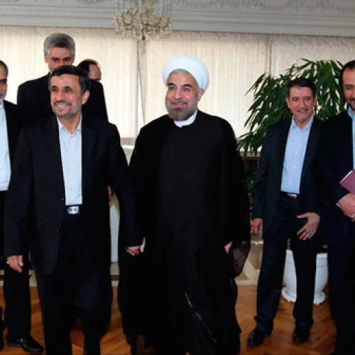 Iranian President Hassan Rouhani (center) with his predecessor, Mahmoud Ahmadinejad (second from left), in June 2013. Credit: Wikimedia Commons.