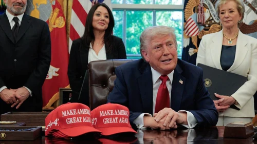 U.S. President Donald Trump speaks to reporters after signing executive orders in the Oval Office at the White House, including one obligating universities to disclose foreign gifts, on April 23, 2025. Photo by Chip Somodevilla/Getty Images.