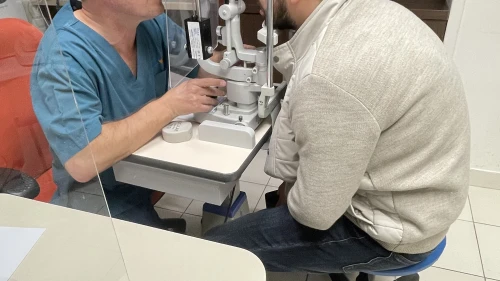 Dr. Yishay Falick examines Arif Hajiyev's cornea transplant at Misgav Ladach hospital in Jerusalem. Credit: Courtesy