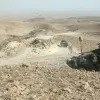 In July 2009, light-armored vehicles with U.S. Marine Corps' Task Force 3rd Light Armored Reconnaissance Battalion, Regimental Combat Team 8, traverse the rocky terrain of the Sinjar Mountains while deployed to the Nineveh province in Iraq. Credit: Sgt. Eric C. Schwartz via Wikimedia Commons.
