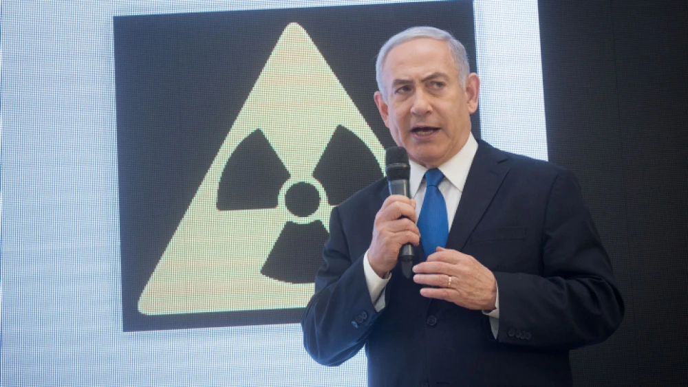Israeli Prime Minister Benjamin Netanyahu presents a trove of Iranian documents on Tehran's nuclear program at a press conference in Tel Aviv, April 30, 2018. Photo by Miriam Alster/Flash90.