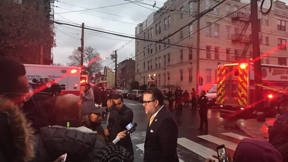 Evan Bernstein speaks to the press following the attack on a kosher grocery store in Jersey City, New Jersey in December 2019. Credit: Courtesy.