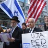 Click photo to download. Caption: The April 8 rally in New York City against what protesters call the inclusion of "pro-BDS groups" in the annual Celebrate Israel Parade. Holding the microphone is Israeli Member of Knesset Nissim Ze’ev (Shas), a surprise speaker at the rally. Credit: Maxine Dovere.