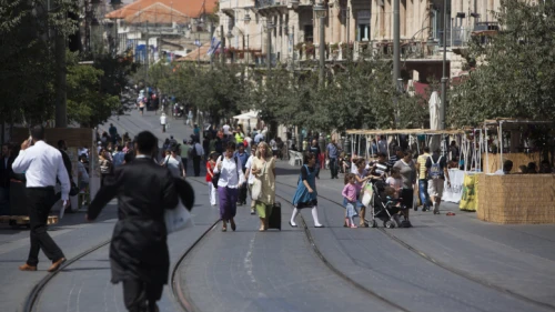 Israelis walking on Jaffa Street in Jerusalem during the Jewish holiday of Sukkot on Sept. 23, 2013. Photo by Yonatan Sindel/Flash90.