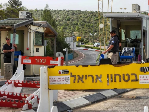 Security guards at the entrance to the city of Ariel in Samaria, April 30, 2022. Credit: Flash90.