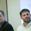 Betzalel Smotrich and Israel Katz during a ceremony at the Ministry of Transport and Road Safety, in Jerusalem, June 23, 2019. Photo by Noam Revkin Fenton/Flash90.