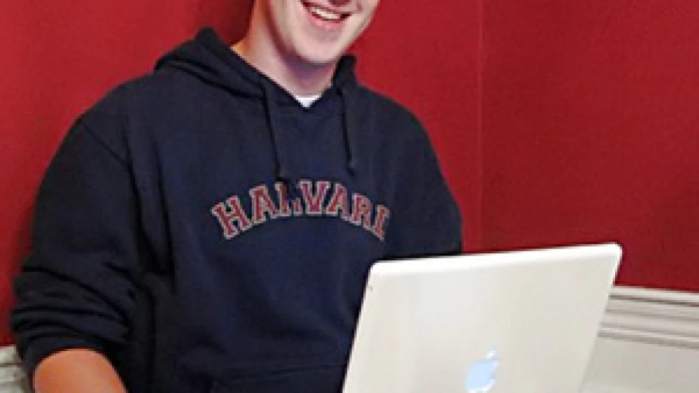 Facebook founder Mark Zuckerberg with his laptop. Credit: Wikimedia Commons.