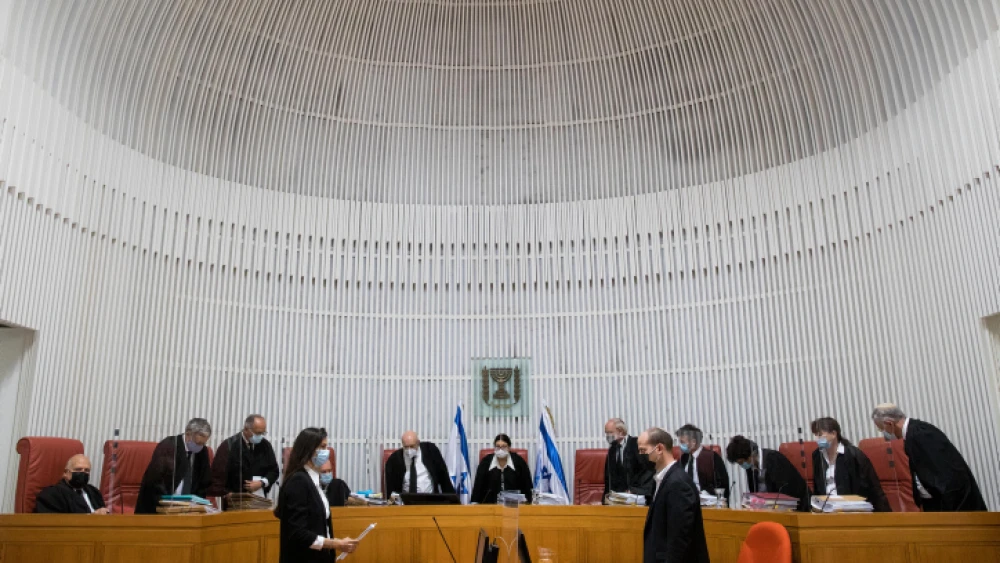Israeli Supreme Court president Esther Hayut and Supreme Court justices arrive to petitions against the Jewish Nation-State Law, at the Supreme Court in Jerusalem, Dec. 22, 2020. Photo by Yonatan Sindel/Flash90.