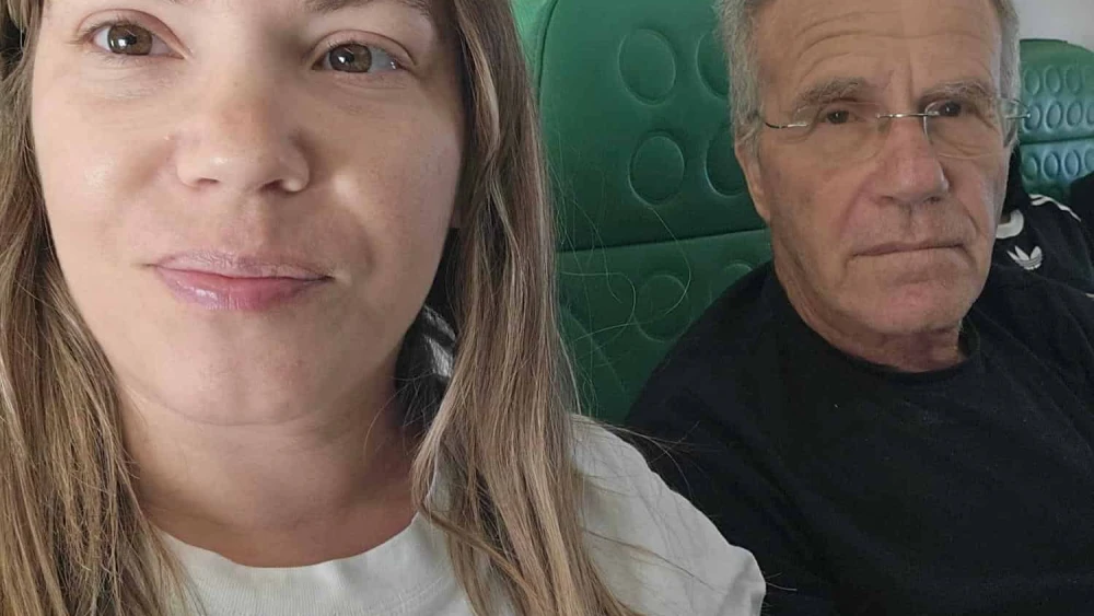 Israelis Lilach and her father on the flight from Larnaca to Aqaba. Credit: Courtesy.