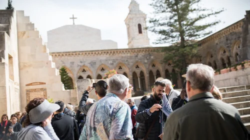 Tourists visit the Church of the Pater Noster, a Roman Catholic Church located on the Mount of Olives in Jerusalem, on Dec. 3, 2018. It is part of a Carmelite monastery, also known as the Sanctuary of the Eleona. Photo by Hadas Parush/Flash90.