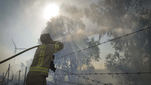 Firefighters work to extinguish wildfires following a missile attack from Lebanon in the Golan Heights, July 20, 2024. Photo by Michael Giladi/Flash90.