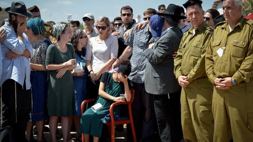 Family and friends mourn 20-year old IDF lone soldier Shlomo Rindenow at his funeral July 18, 2016. Rindenow was killed along with another Israeli soldier when a grenade accidentally exploded near an army post in the Golan Heights. Credit: Ben Drori/Flash90.