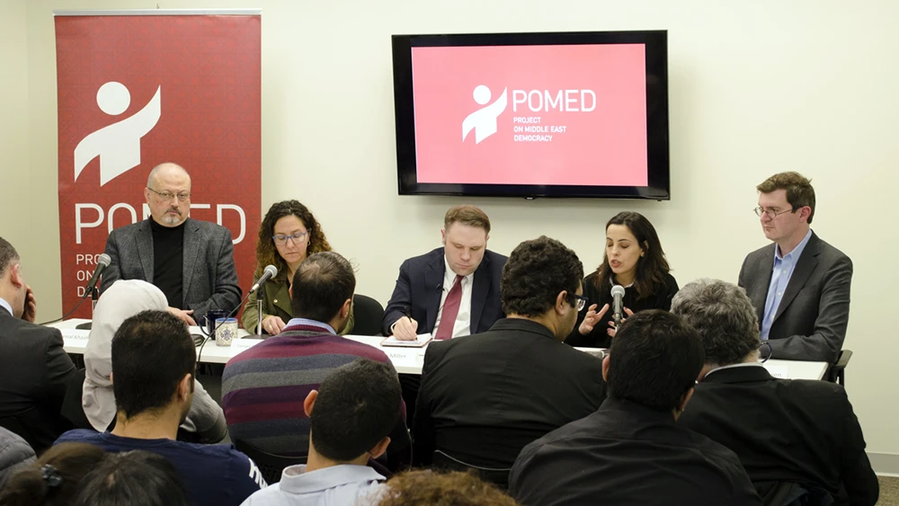 Journalist Jamal Khashoggi (left) at a 2018 project on Middle East Democracy at a forum called “Mohammed bin Salman's Saudi Arabia: A Deeper Look,” March 21, 2018. Credit: Wikimedia Commons.
