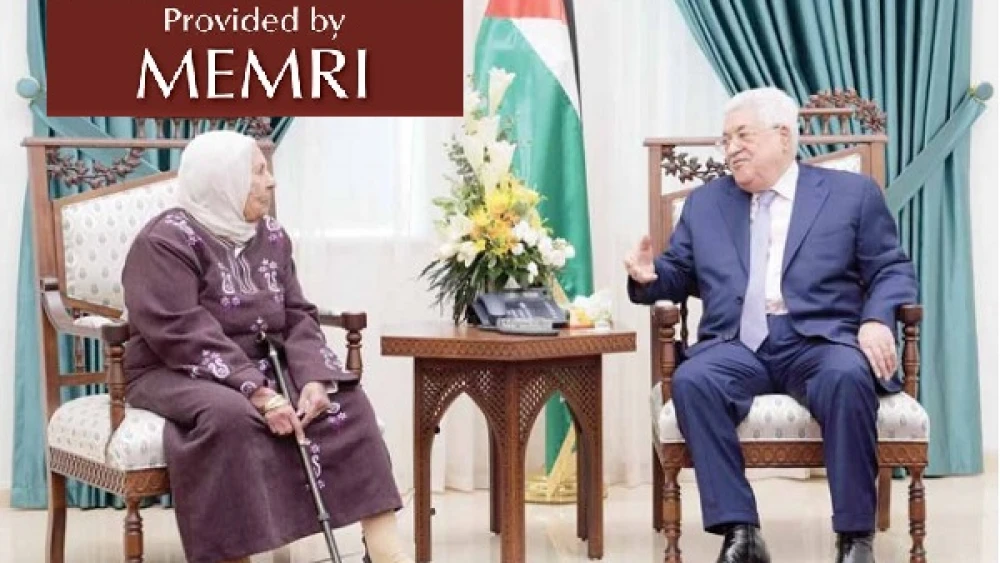 Palestinian Authority leader Mahmoud Abbas with Karim Younis's mother (Image: “Al-Hayat Al-Jadida,” Nov. 19, 2019). (MEMRI)