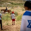 Israelis participate in a march to celebrate Israel's 71st Independence Day, near Havat Gilad, in Judea and Samaria, on May 9, 2019. Photo by Hillel Maeir/Flash90.